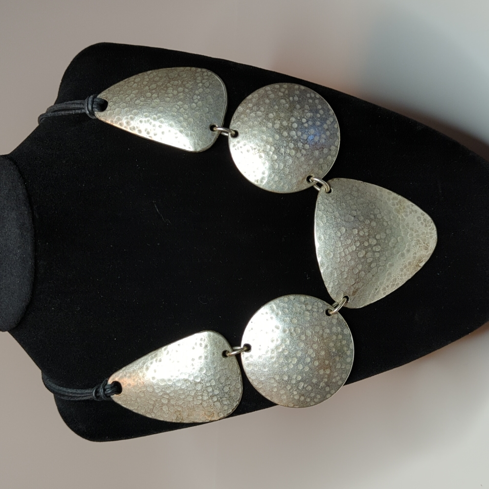 Handmade pewter necklace.